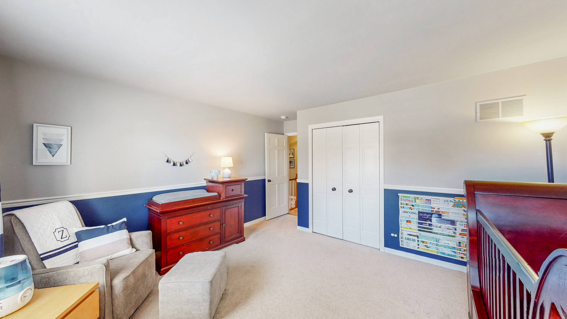 821 South River Road Naperville, IL 60540 - Photo 24 of 32 a bedroom with a bed and a dresser