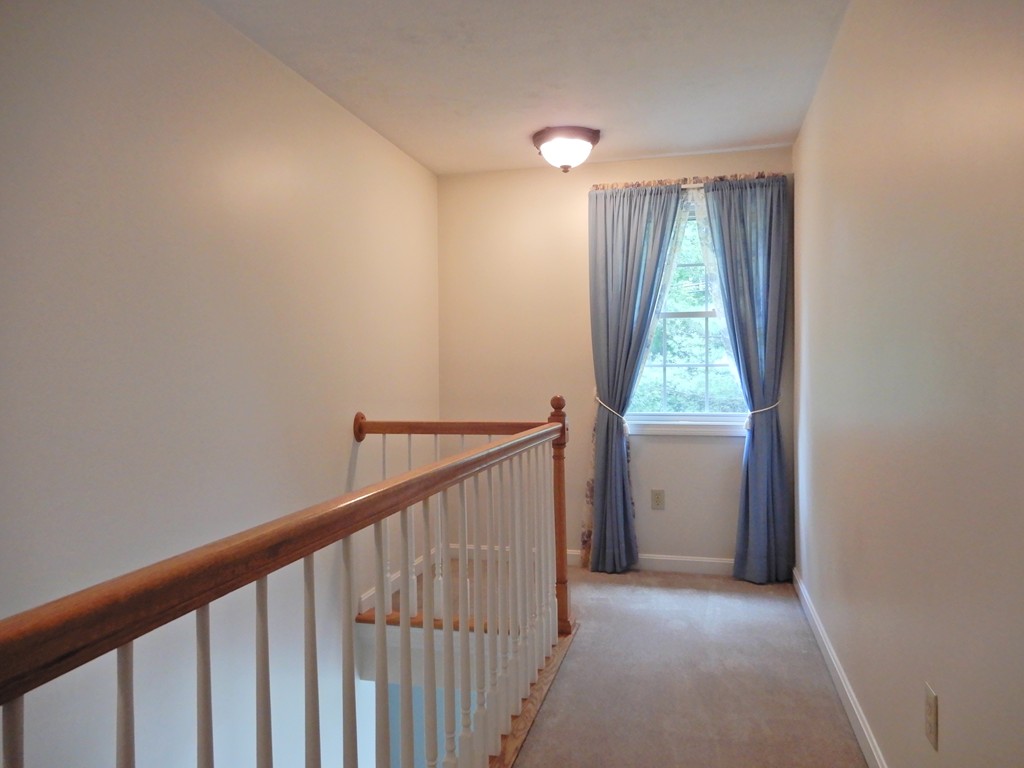82 Town Farm Road Brookfield, MA 01506 - Photo 21 of 28 a view of a hallway with a window