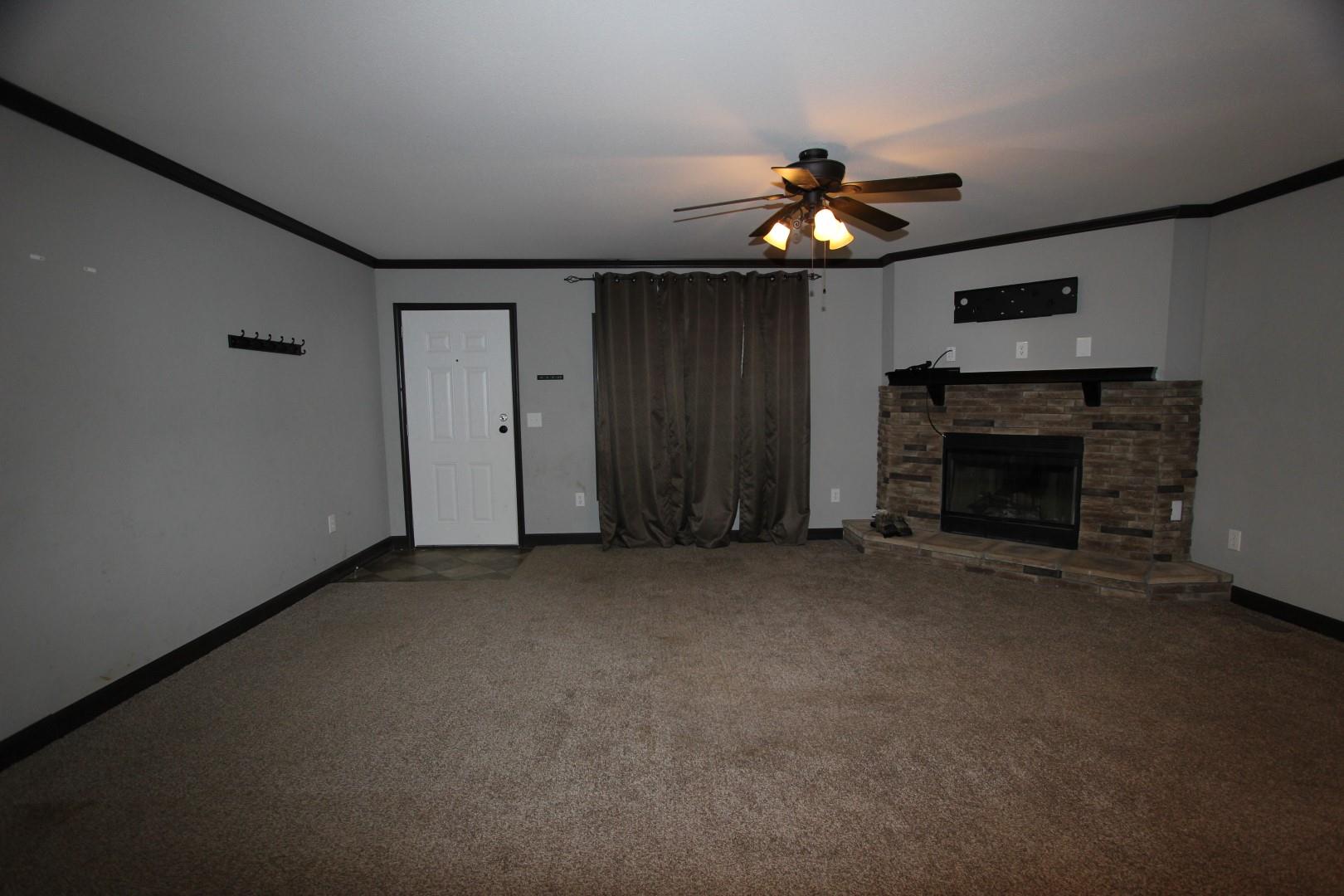 182 River Road Dover, TN 37058 - Photo 9 of 30 Gathering room with corner fireplace.