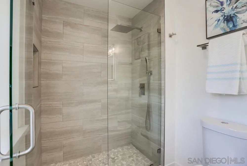 916 Alyssum Road Carlsbad, CA 92011 - Photo 27 of 42 a bathroom with a shower