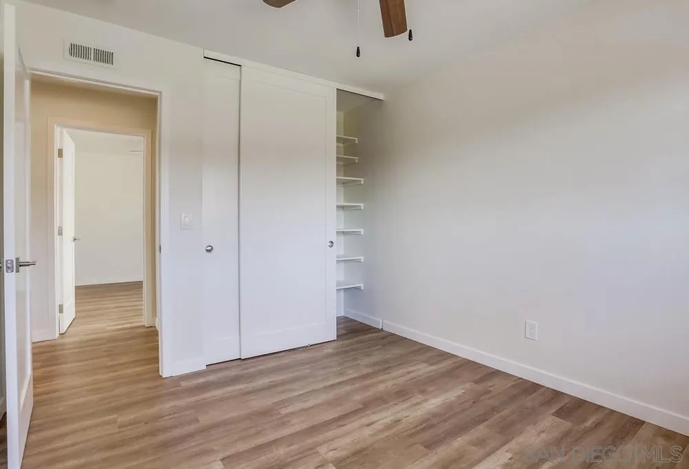 916 Alyssum Road Carlsbad, CA 92011 - Photo 33 of 42 wooden floor in an empty room