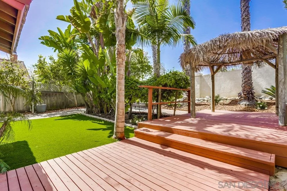 916 Alyssum Road Carlsbad, CA 92011 - Photo 37 of 42 a view of a swimming pool with a patio