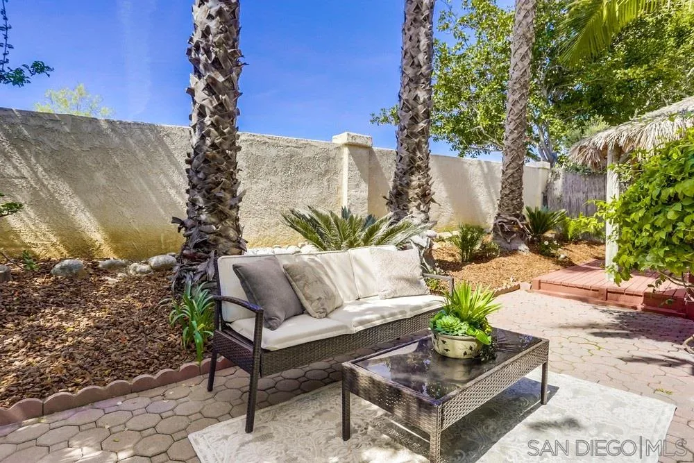 916 Alyssum Road Carlsbad, CA 92011 - Photo 40 of 42 a view of a couches in a patio with a fire pit