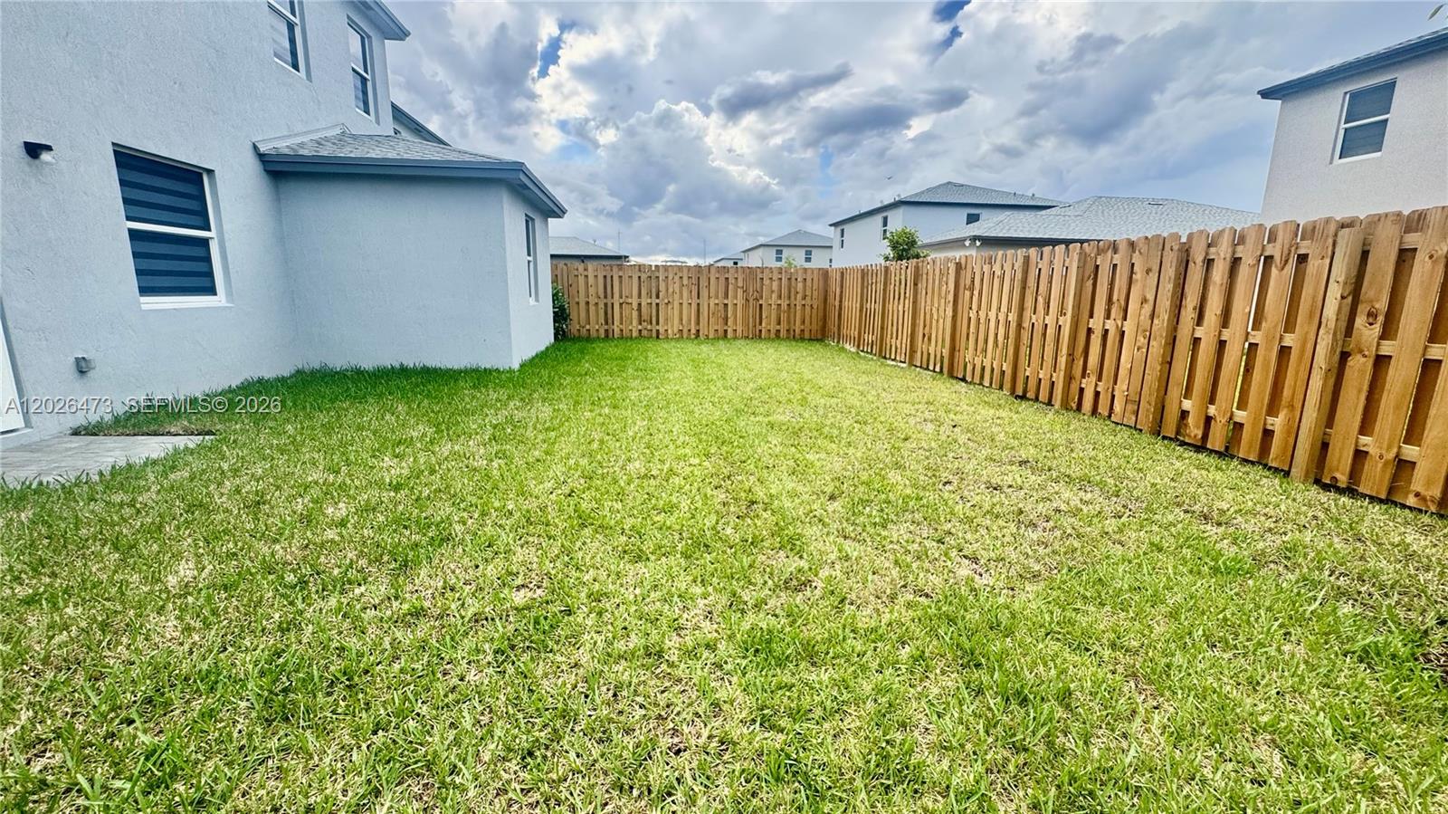 19479 Southwest 340th Street, Unit 1 Homestead, FL 33034 - Photo 46 of 58 a view of a backyard