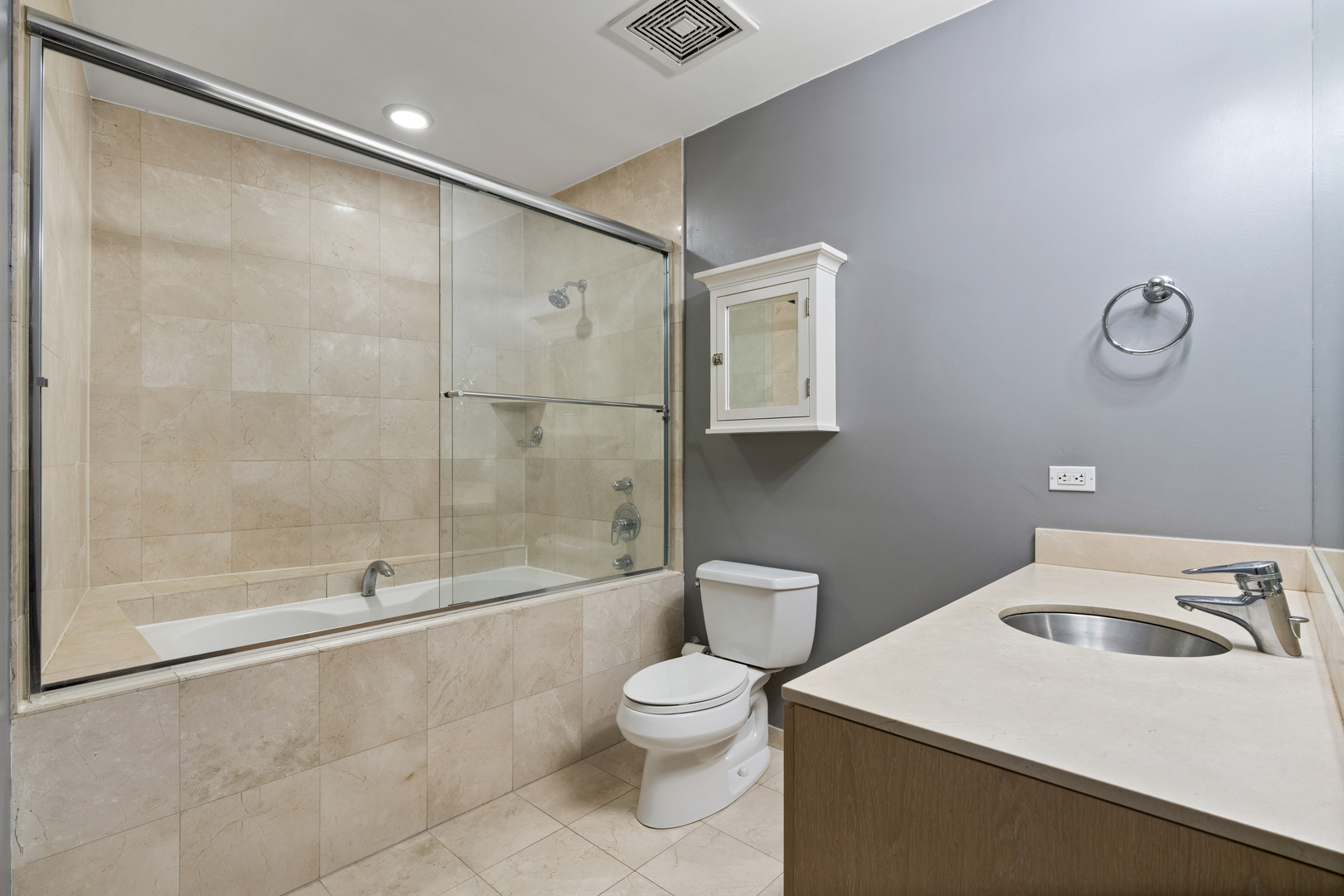 950 West Erie Street, Unit 602 Chicago, IL 60642 - Photo 15 of 18 a bathroom with a sink a toilet and shower