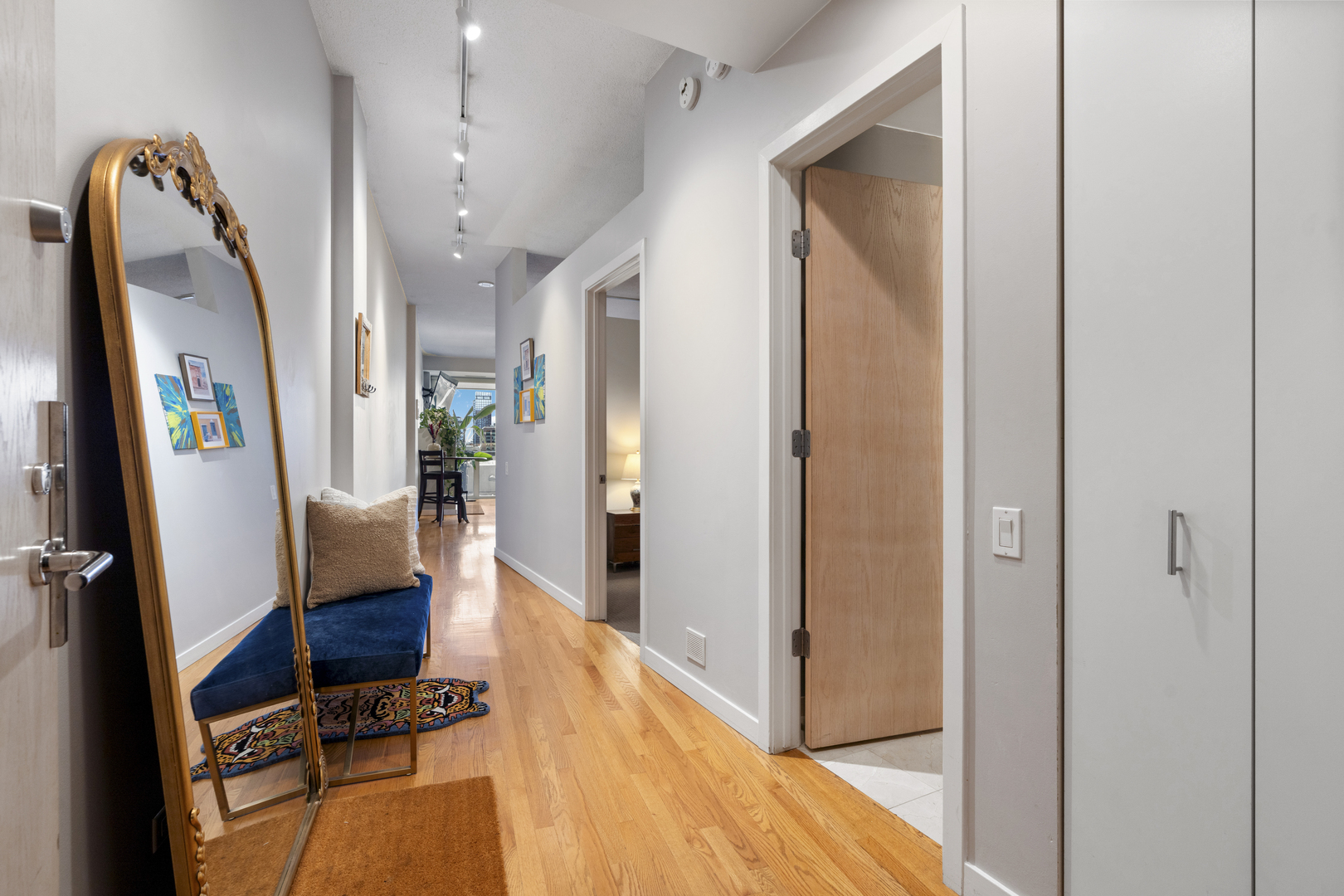 950 West Erie Street, Unit 602 Chicago, IL 60642 - Photo 2 of 18 a view of a hallway with furniture and a livingroom view