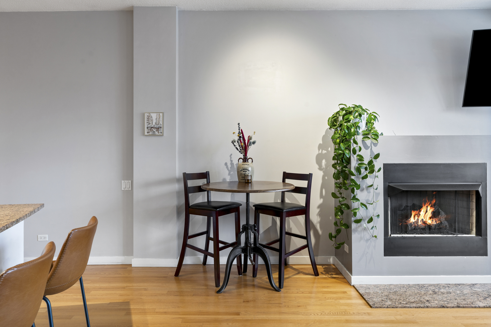950 West Erie Street, Unit 602 Chicago, IL 60642 - Photo 8 of 18 a dining room with furniture and wooden floor
