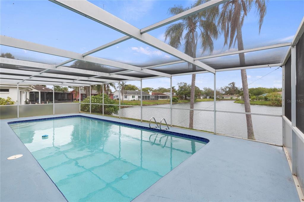 3409 Springfield Drive Holiday, FL 34691 - Photo 32 of 37 a view of a swimming pool with a outdoor space