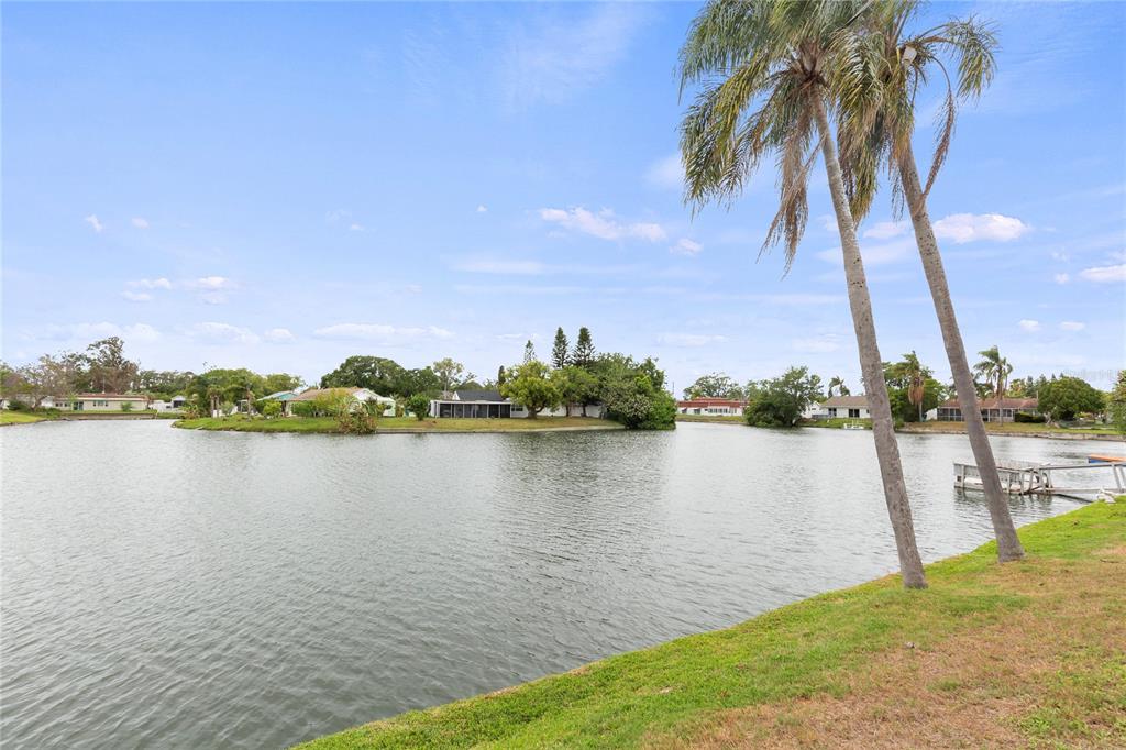 3409 Springfield Drive Holiday, FL 34691 - Photo 35 of 37 a view of a lake with a beach
