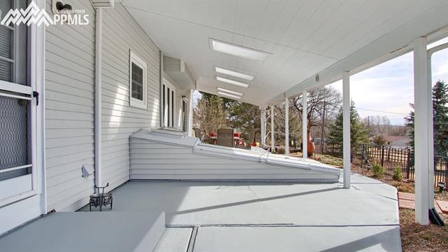 5103 Rocking R Drive Colorado Springs, CO 80915 - Photo 2 of 4 Large covered patio can be accessed from the family room and laundry room. Covered with skylights as well! The patio is 14 x 60!