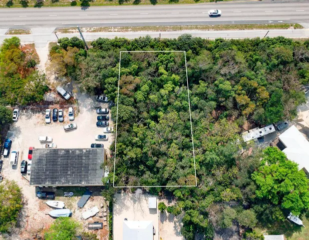 a view of a lake with a building in the background