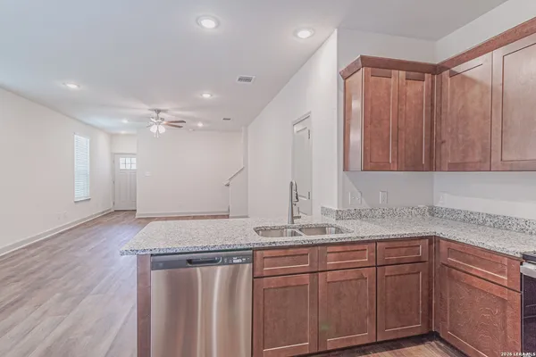 a bathroom with a sink and mirror