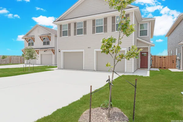 a house with a garden and pathway