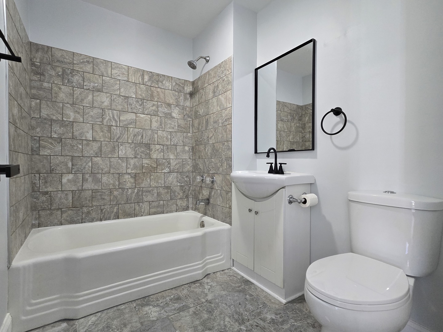 328 Rosewood Avenue Aurora, IL 60505 - Photo 17 of 24 a bathroom with a toilet a sink and mirror