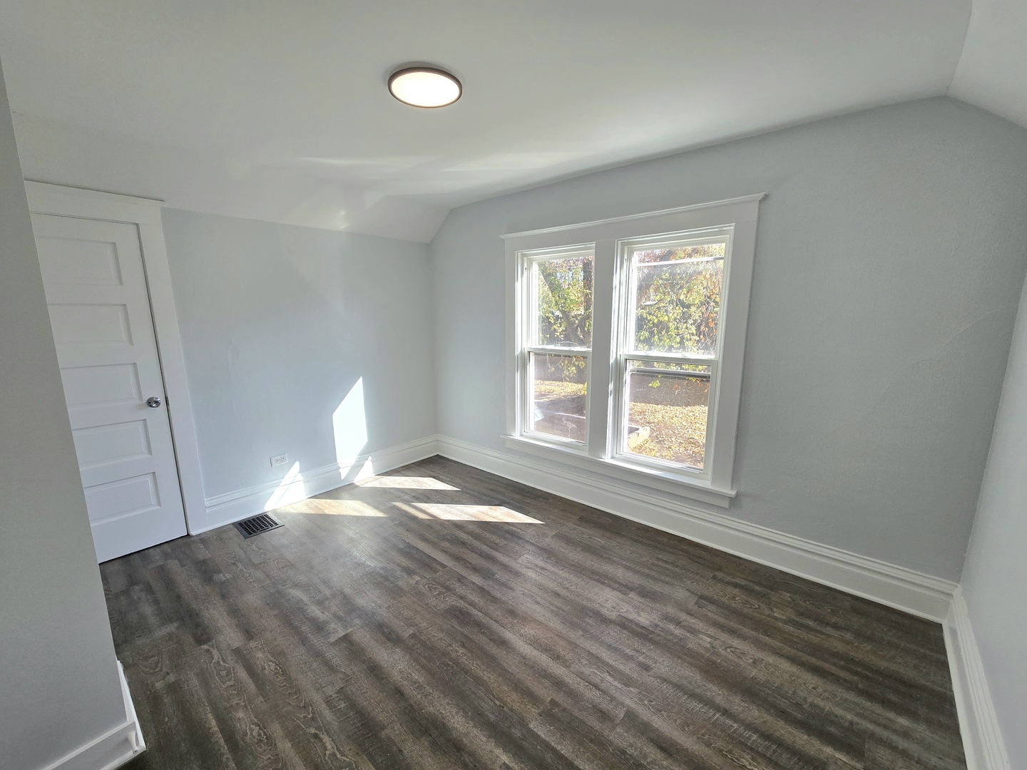 328 Rosewood Avenue Aurora, IL 60505 - Photo 20 of 24 a view of empty room with wooden floor and fan