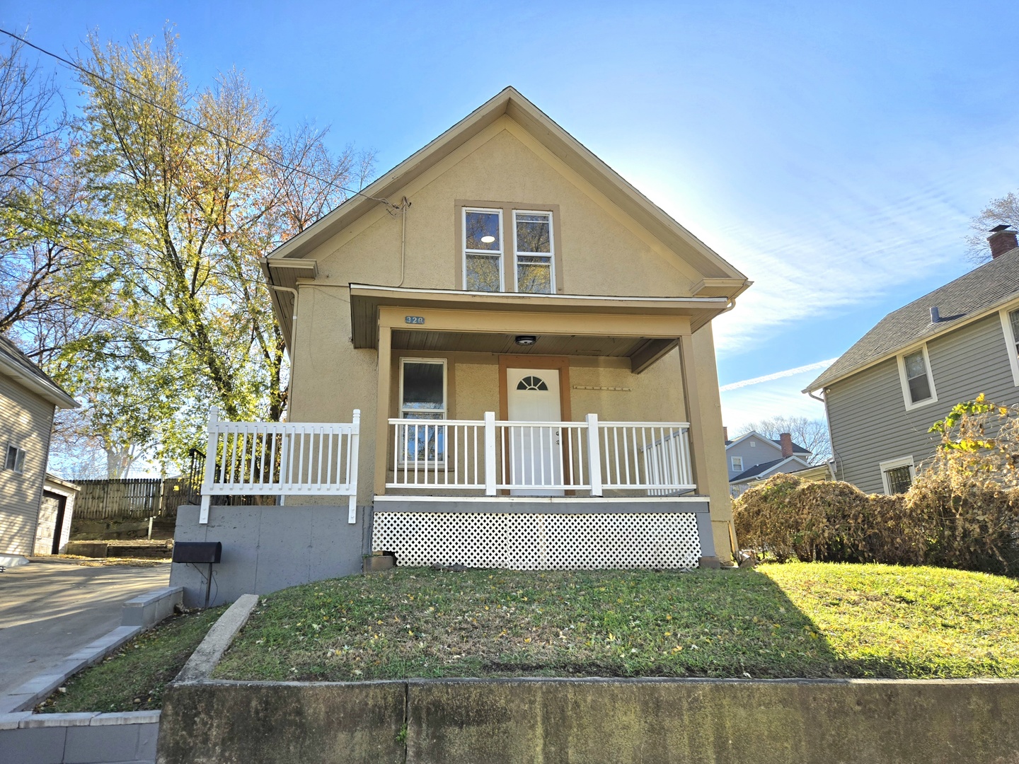 328 Rosewood Avenue Aurora, IL 60505 - Photo 2 of 24 a front view of a house with a yard