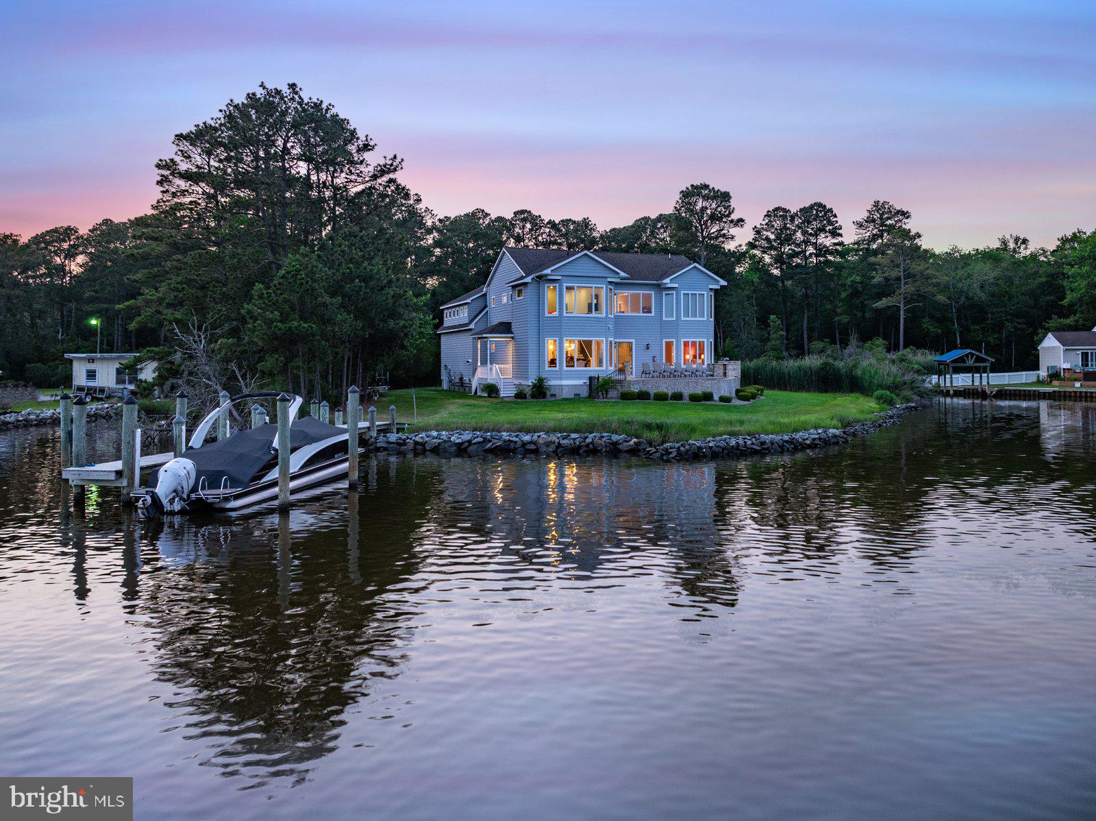 11640 Gum Point Road Berlin, MD 21811 - Photo 117 of 119 Serene waterfront retreat at dusk.