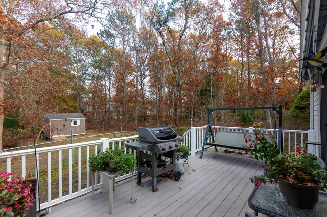 a view of a table and chairs in the balcony