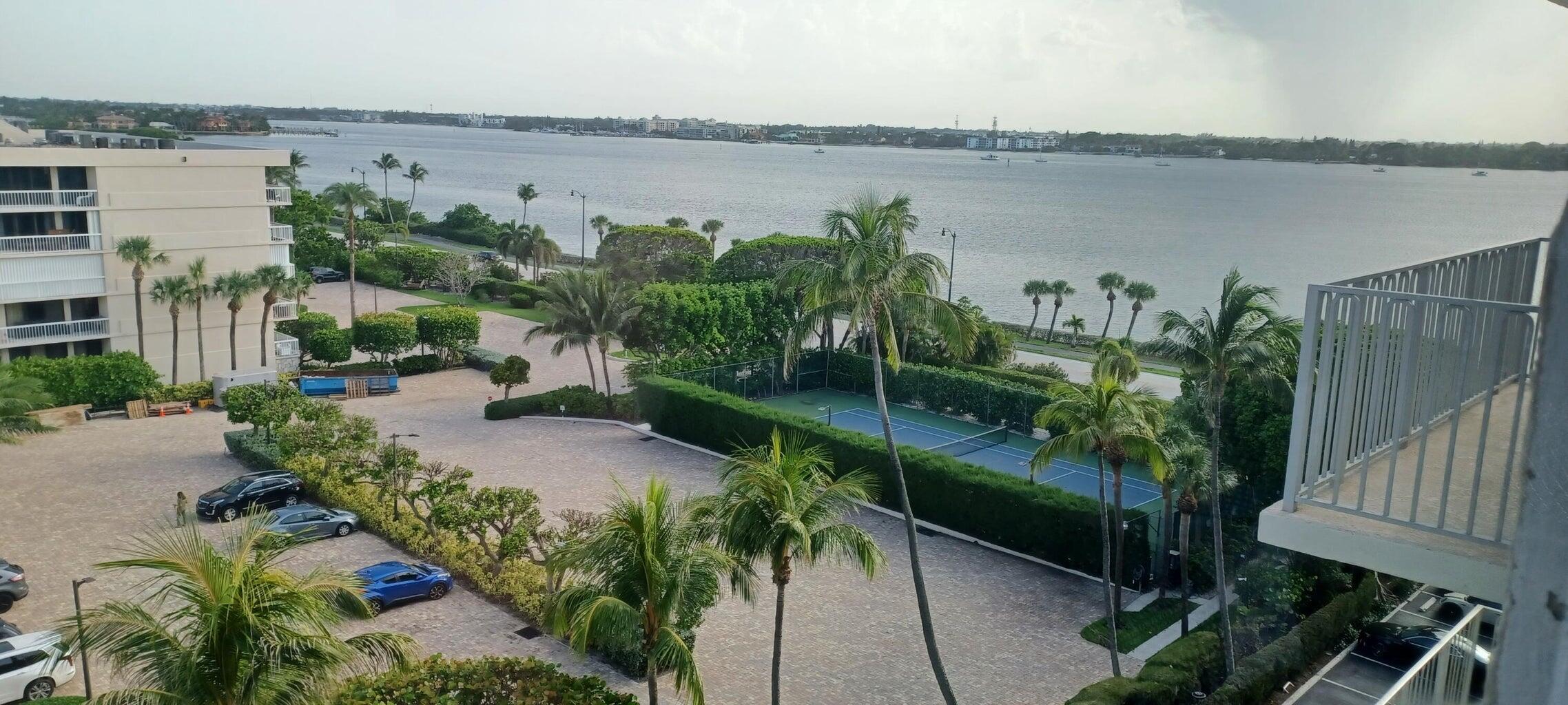 3230 South Ocean Boulevard, Unit E610 Palm Beach, FL 33480 - Photo 12 of 31 a view of a lake with a building in the back