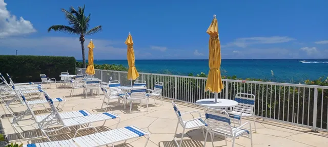 a view of a swimming pool with a patio