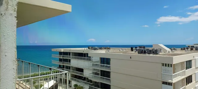 a view of a balcony with city view