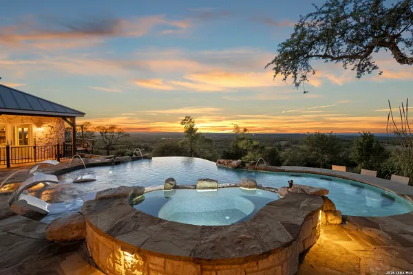 a view of a swimming pool and lake view