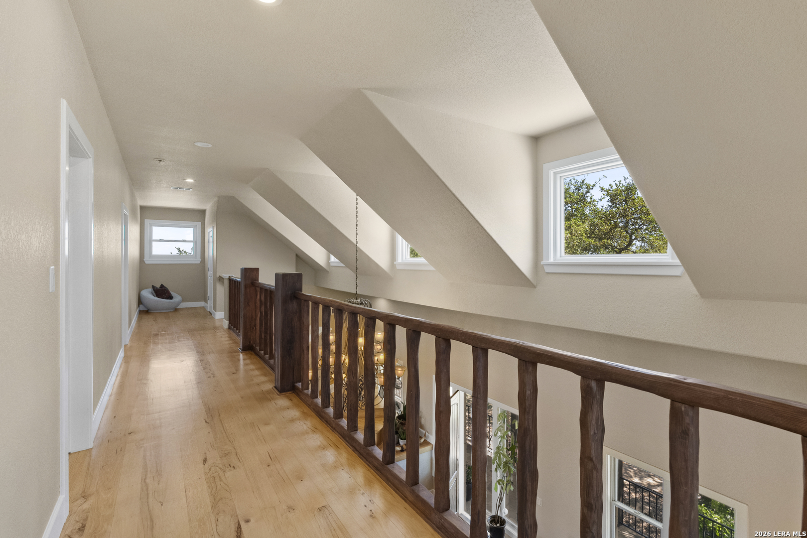 140 Kuntz Run Bulverde, TX 78163 - Photo 23 of 49 a view of hallway with wooden floor and stairs