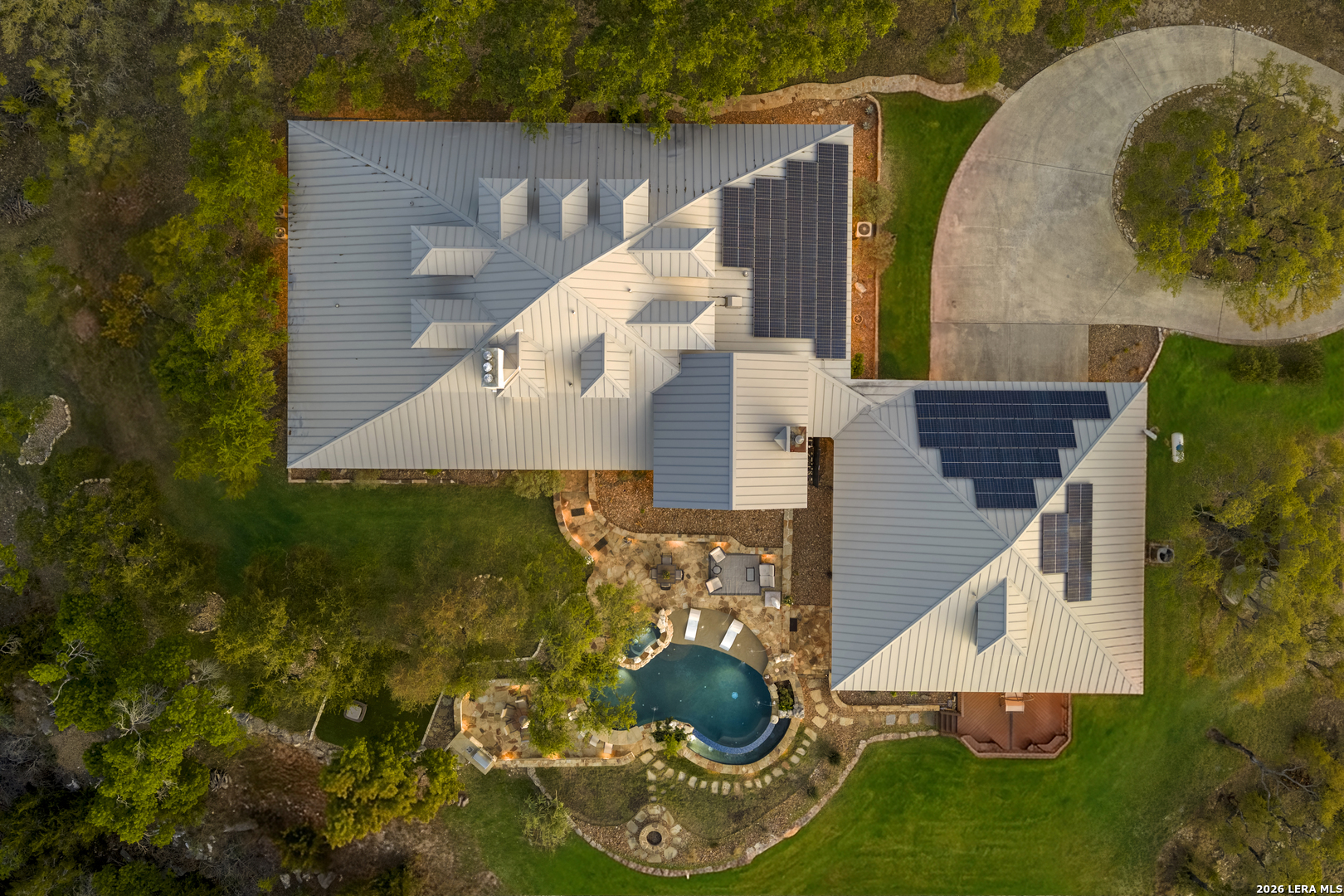 140 Kuntz Run Bulverde, TX 78163 - Photo 24 of 49 an aerial view of a house with outdoor space and a lake view