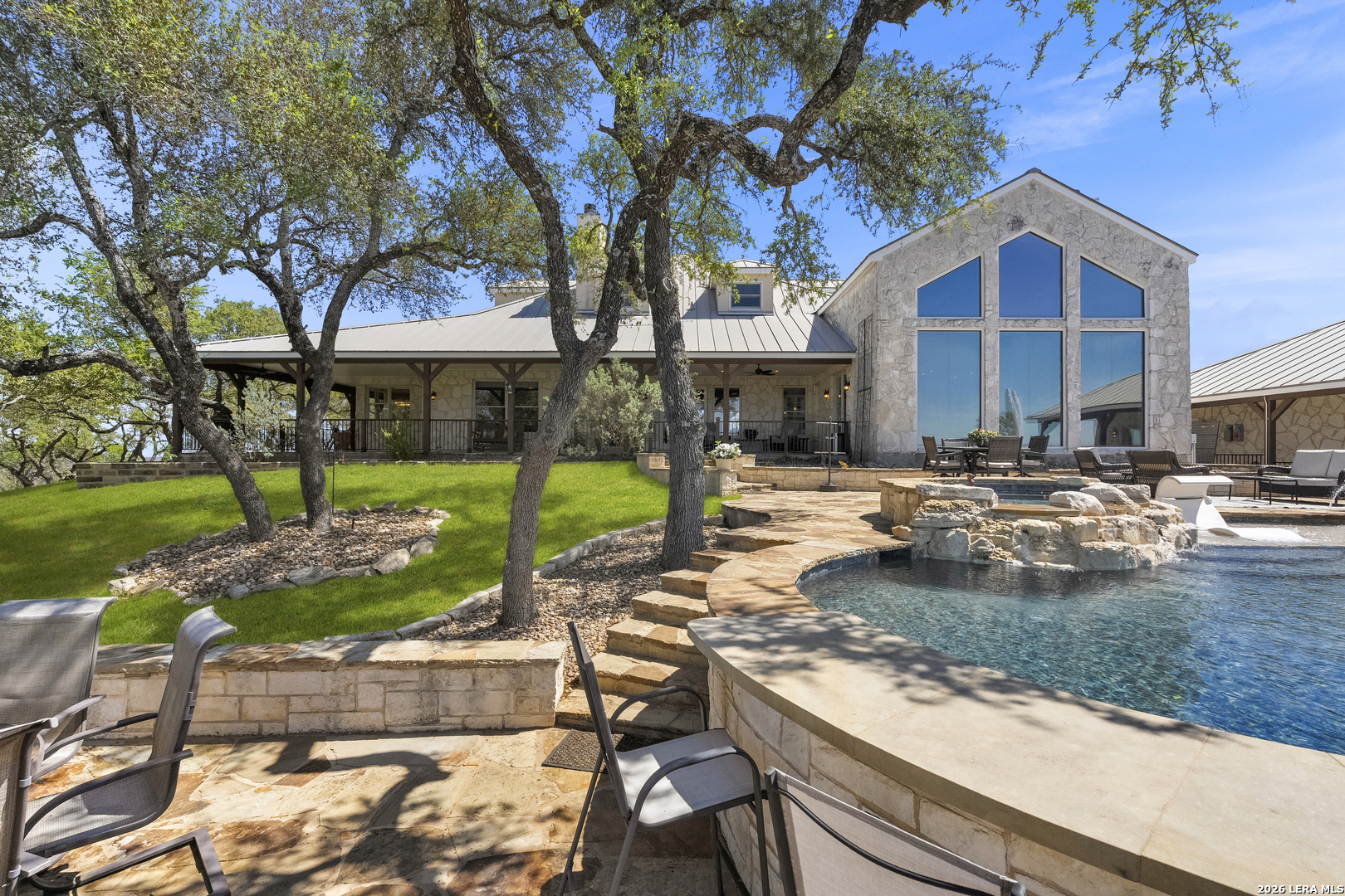 140 Kuntz Run Bulverde, TX 78163 - Photo 25 of 49 a view of a house with backyard and sitting area