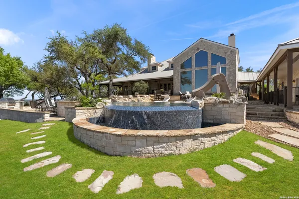 a view of a house with swimming pool