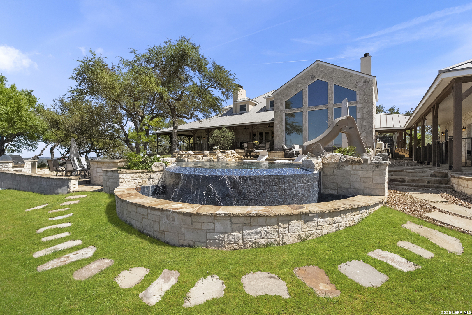 140 Kuntz Run Bulverde, TX 78163 - Photo 26 of 49 a view of a house with swimming pool
