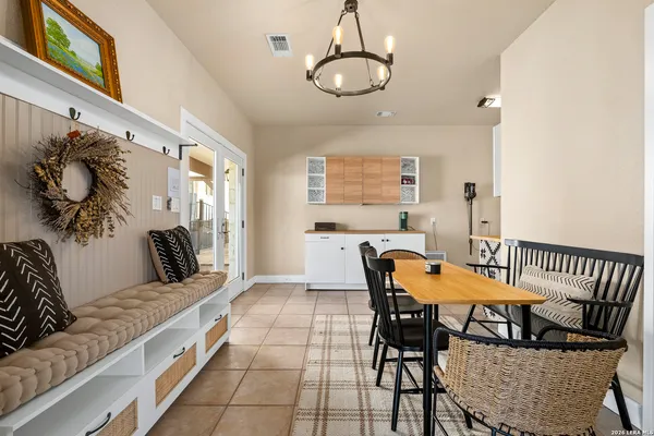 a view of a dining room with furniture