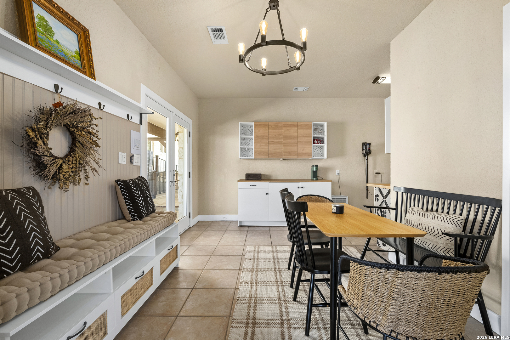 140 Kuntz Run Bulverde, TX 78163 - Photo 34 of 49 a view of a dining room with furniture window and wooden floor