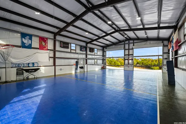 a view of a swimming pool with a yard