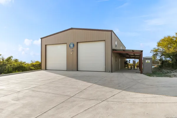 a view of a park with large trees