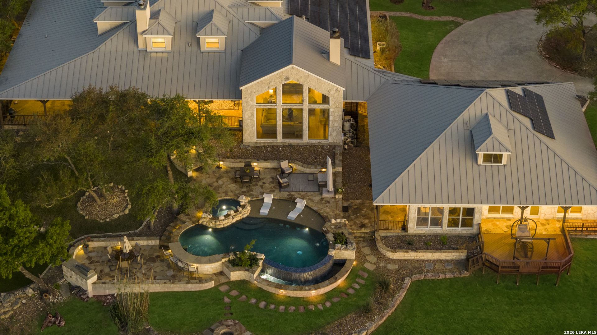 140 Kuntz Run Bulverde, TX 78163 - Photo 48 of 49 a aerial view of a house with swimming pool garden and patio