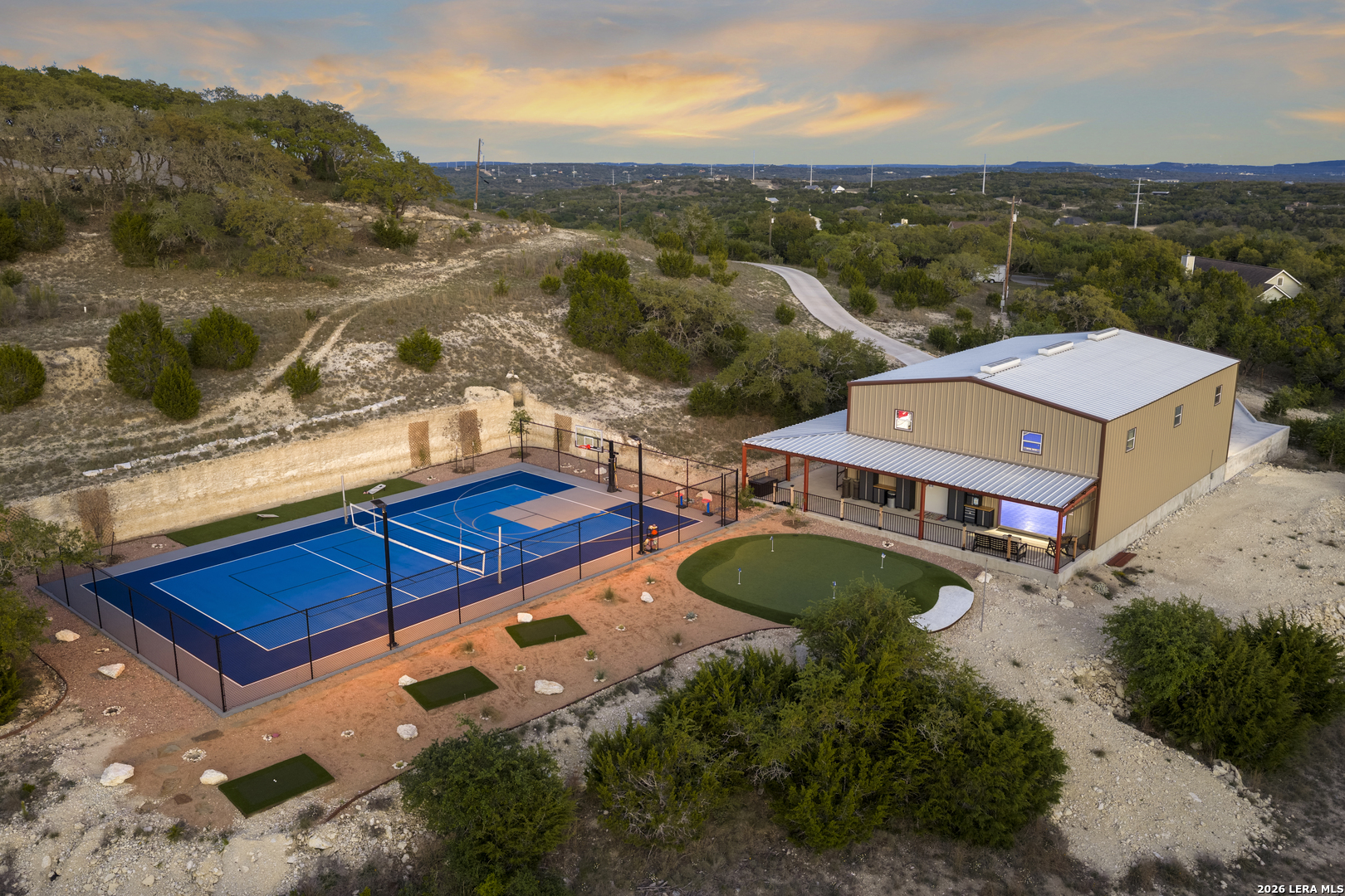 140 Kuntz Run Bulverde, TX 78163 - Photo 5 of 49 a view of a pool with a lake view