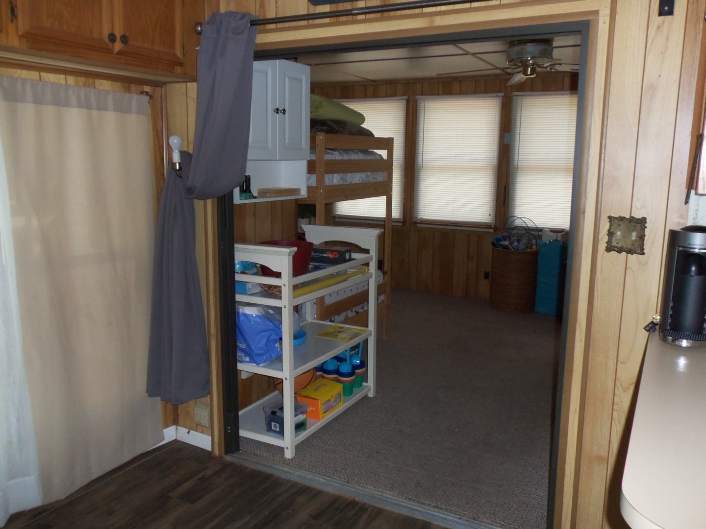 21-216 Woodhaven Sublette, IL 61367 - Photo 14 of 23 a view of walk in closet with clothes and shoes