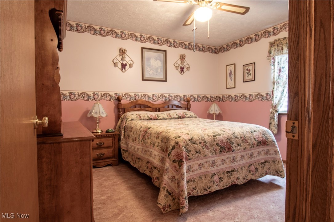 65525 Larrick Ridge Road Cambridge, OH 43725 - Photo 7 of 40 Bedroom with ceiling fan