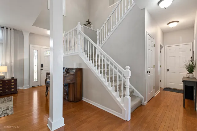 a view of entryway with wooden floor