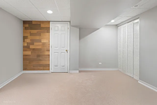 a view of an empty room with stairs