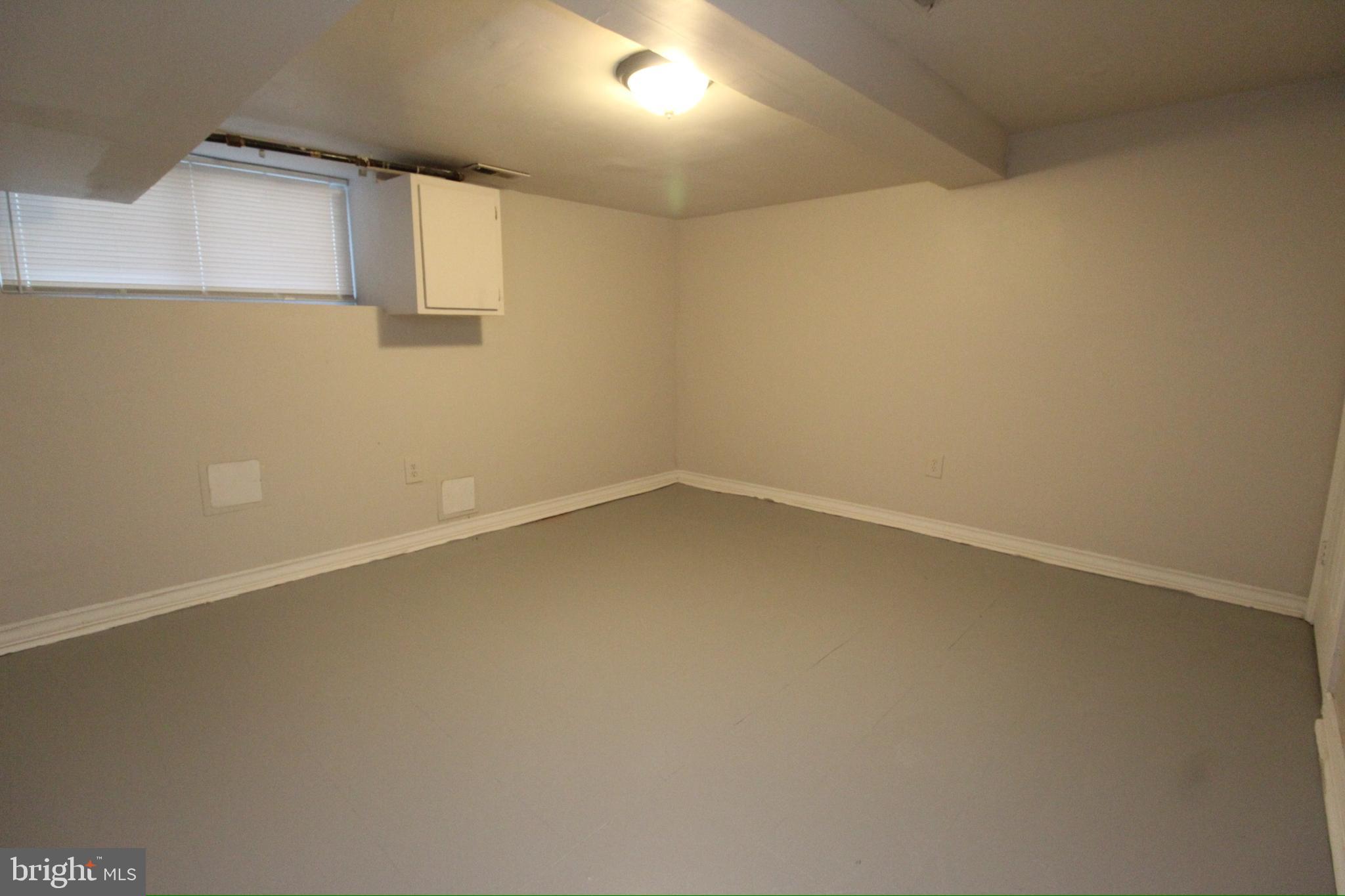 434 East 28th Street Baltimore, MD 21218 - Photo 35 of 37 a view of an empty room