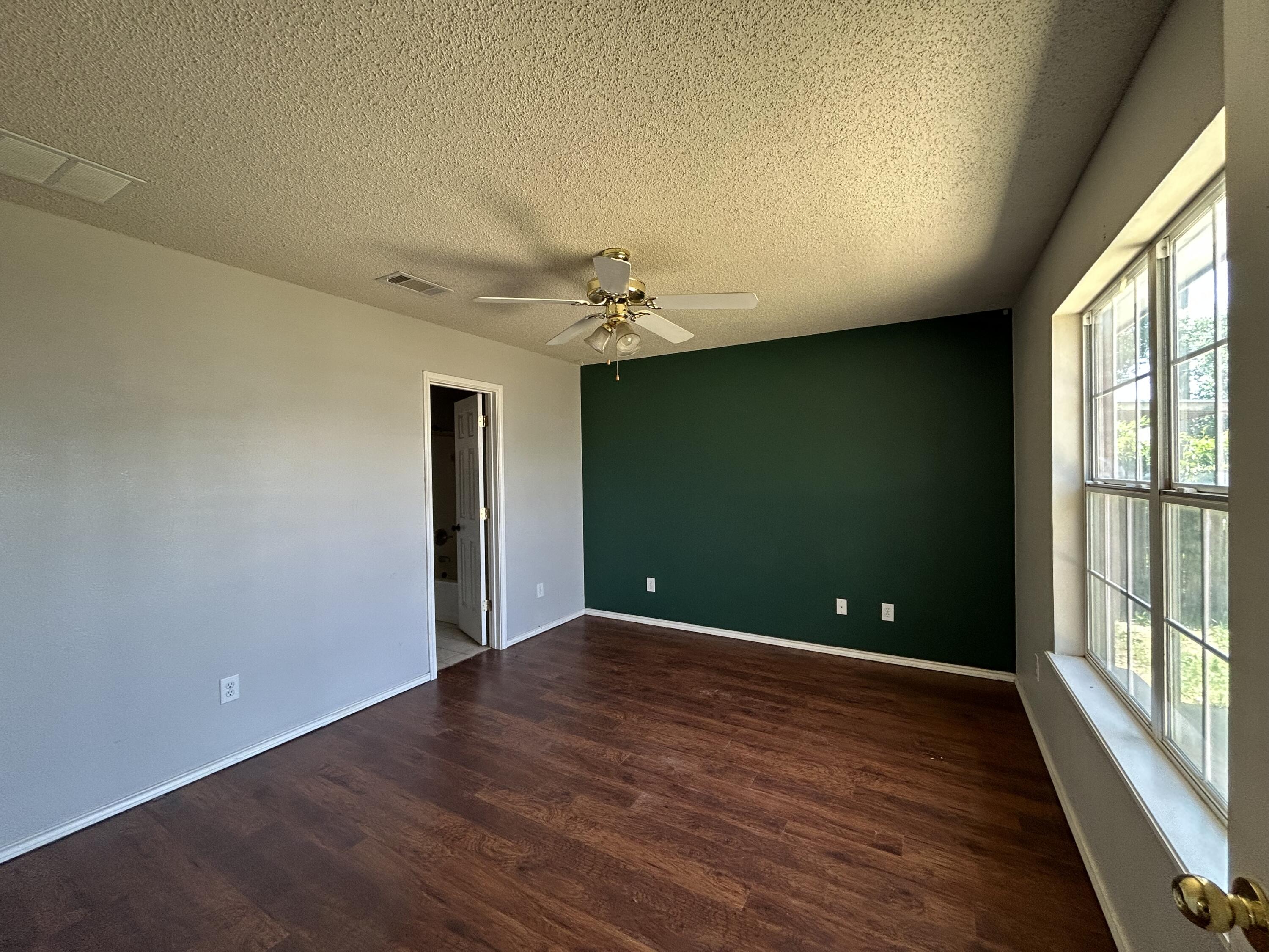 1440 77th Street Lubbock, TX 79423 - Photo 4 of 9 IMG_4678