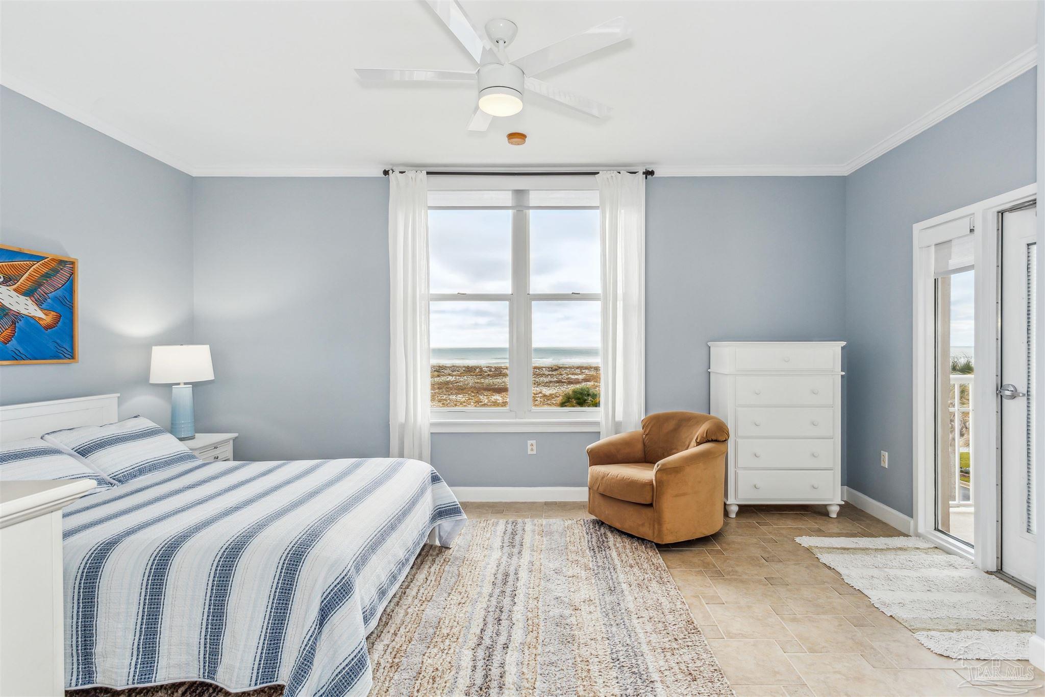800 Fort Pickens Road, Unit 204 Pensacola Beach, FL 32561 - Photo 23 of 45 a bedroom with a bed and window