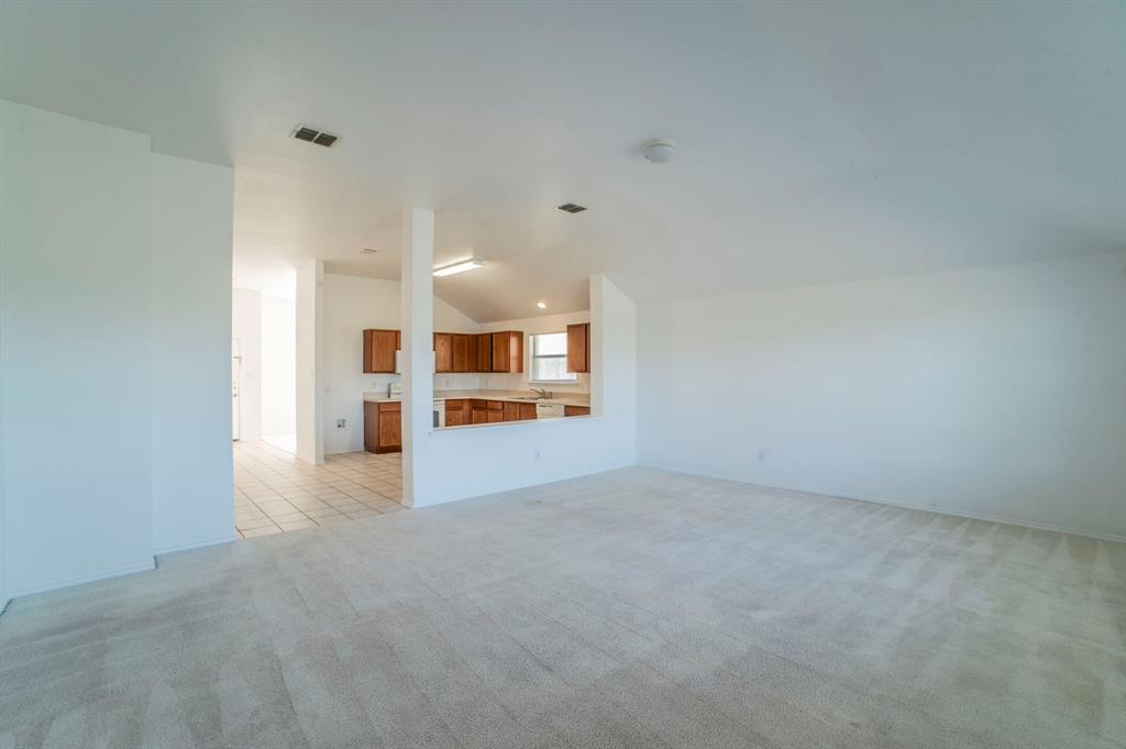 6333 Pool View Drive Dallas, TX 75249 - Photo 12 of 37 a view of a kitchen with a sink