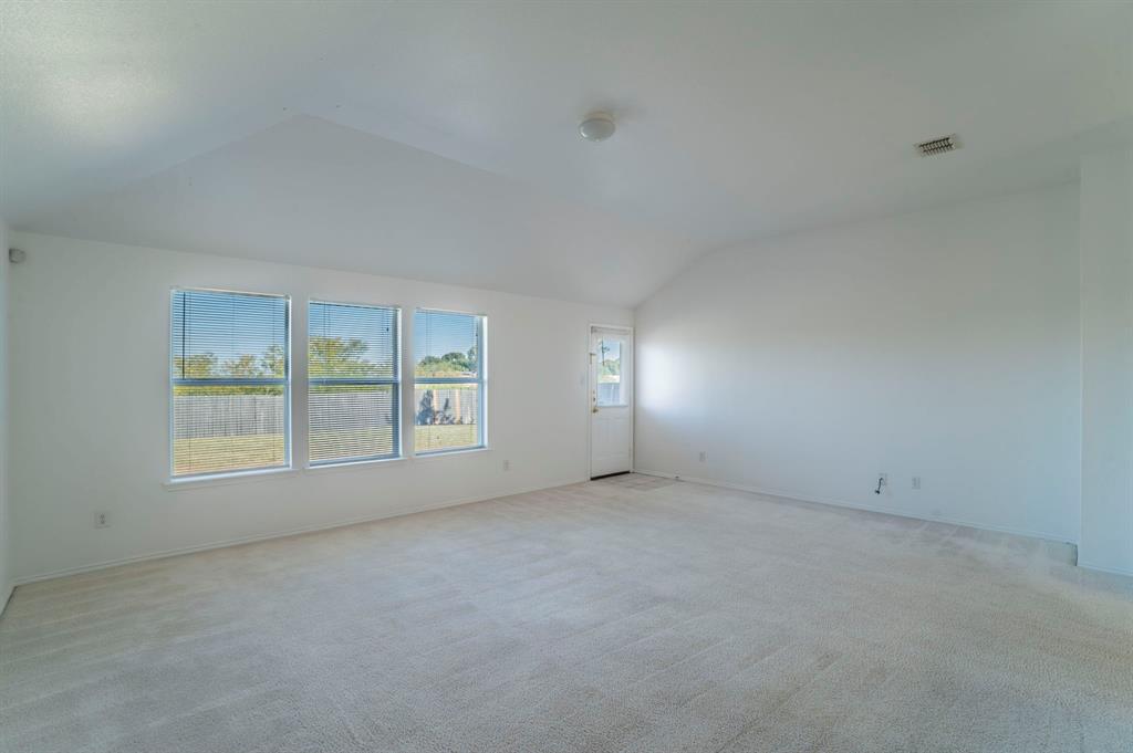 6333 Pool View Drive Dallas, TX 75249 - Photo 14 of 37 an empty room with a window