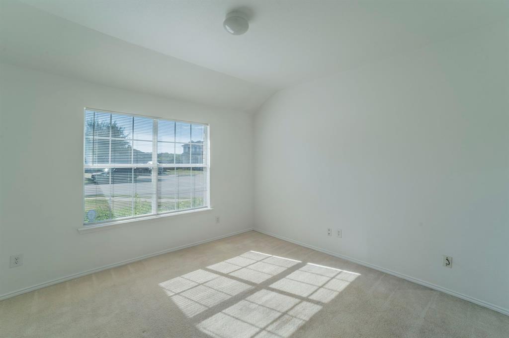 6333 Pool View Drive Dallas, TX 75249 - Photo 25 of 37 an empty room with a window