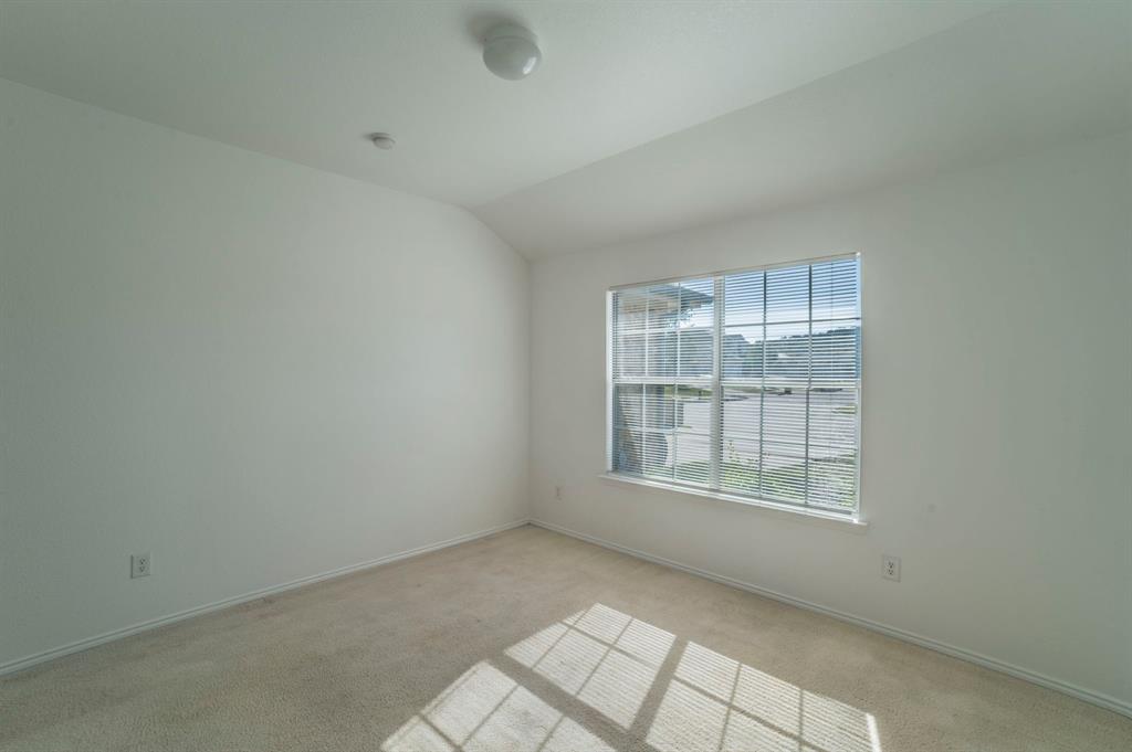 6333 Pool View Drive Dallas, TX 75249 - Photo 26 of 37 an empty room with windows