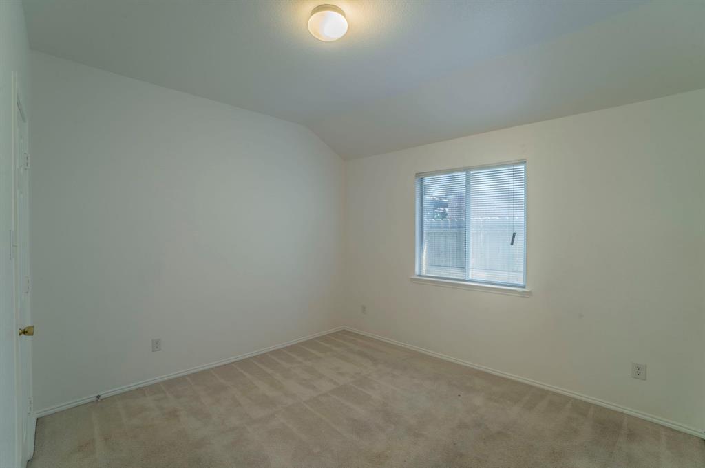 6333 Pool View Drive Dallas, TX 75249 - Photo 28 of 37 an empty room with a window