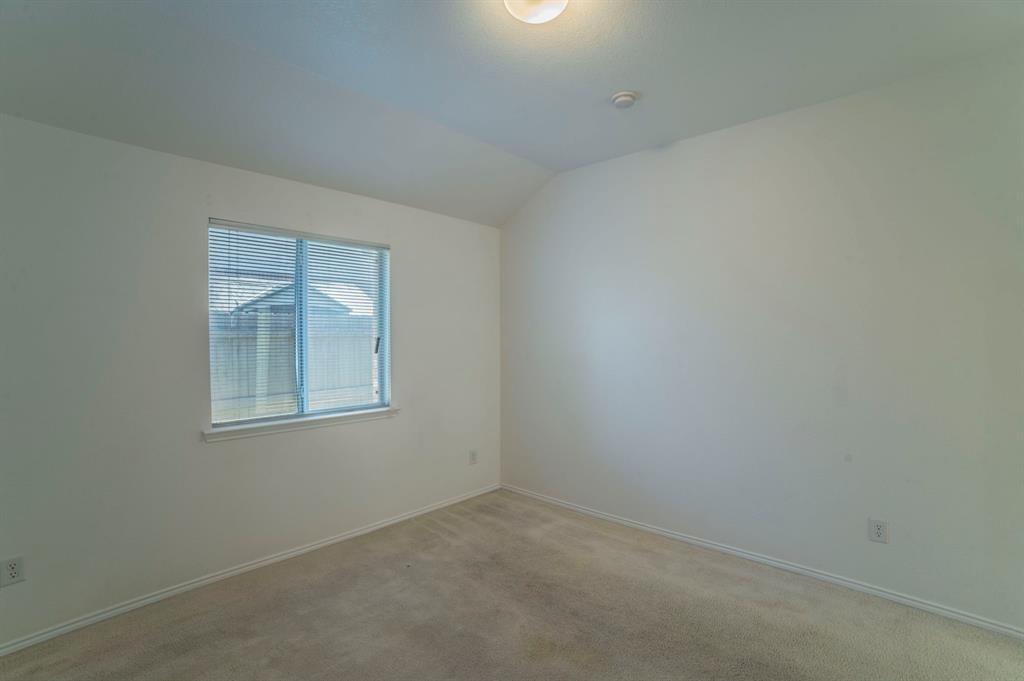 6333 Pool View Drive Dallas, TX 75249 - Photo 29 of 37 an empty room with a window
